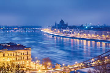 Fototapeta na wymiar Danube river in Budapest. Winter night, ice floes