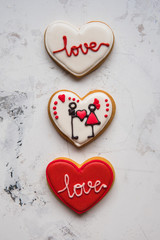 Obraz na płótnie Canvas Cookies hearts with white and red icing Love for Valentine's Day