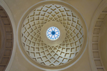 Circular interior of an ancient church concrete dome with natural light