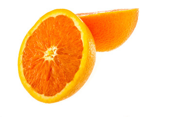 Close up of fresh sunkist orange cut half isolated