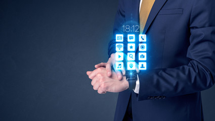 Businessman wearing smartwatch.
