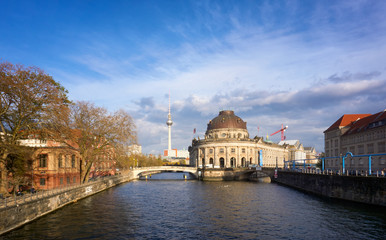 View of Bode Museum and Berlin TV Tower from Eberbruecke bridge in Berlin at sunset