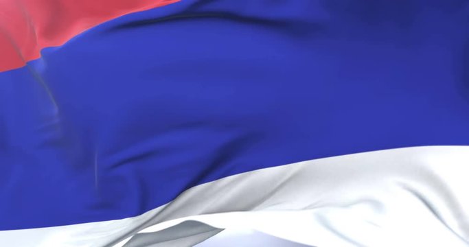 Republika Srpska flag waving at wind in slow with blue sky, loop