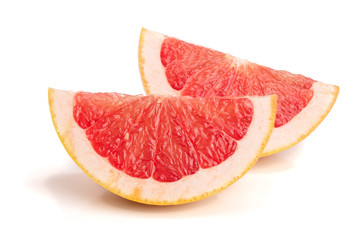 Grapefruit slices isolated on white background close-up