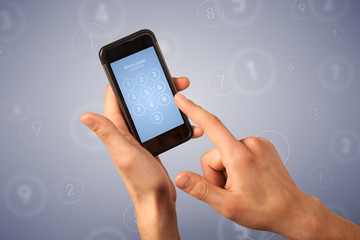 Female hand holding smartphone