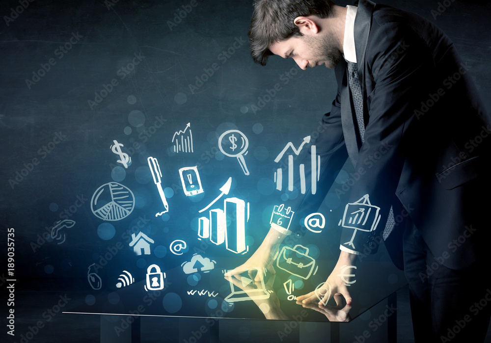 Poster Man touching technology smart table with business icons