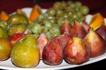 variety of fresh fruits served on a plate