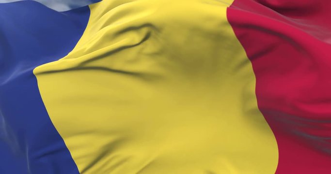 Flag of Romania waving at wind in slow with blue sky, loop