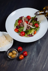 Top view of fresh salad with tomatoes and cheese