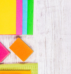 Fototapeta premium Set of cleaning up stuff on wooden background.