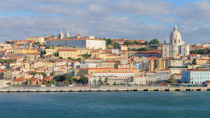 Cityscape of Lisbon, Portugal.  Brightly Coloured Buildings.  Monastery of Sao Vicente de Fora and Santa Engracia Church (National Pantheon)