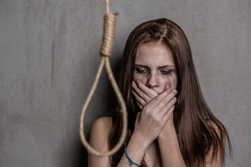 frightened girl near the gallows
