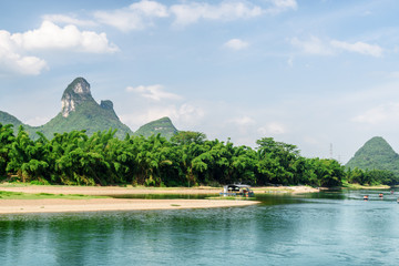 The Li River (Lijiang River) among green bamboo forest, China