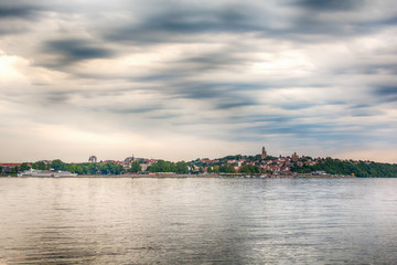 Fototapeta na wymiar Belgrade, Serbia May 19, 2016: Panorama of Zemun and the famous Gardos seen over the river Danube