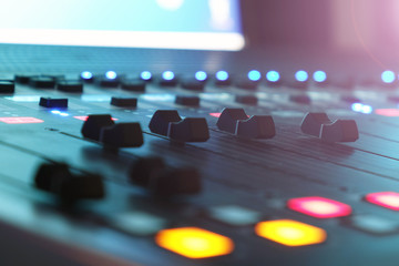 The audio mixer in the Studio, the handles move up and down, all ready to record.
