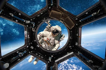 Deurstickers Astronaut in de ruimte © Andrei Armiagov