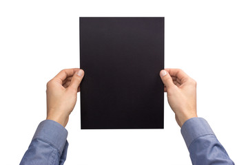 Mockup A4 letter vertical empty blank black holds the man in his hand in shirt. Isolated on a white background