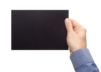Mockup A5 letter horizontally empty blank black holds the man in his hand in shirt. Isolated on a white background
