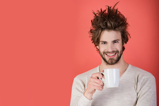 Man With Disheveled Hair Drink Mulled Wine.