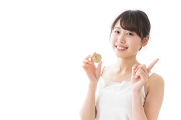ビットコイン・仮想通貨を持つ女性