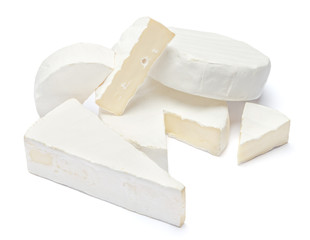 Pile of brie or camambert cheese on a white background