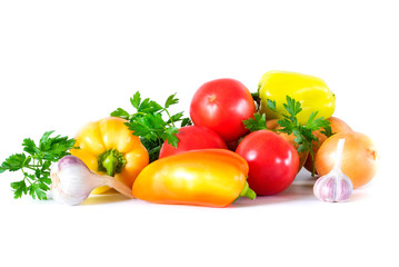 Still life with bell pepper cucumbers tomatoes and garlic	