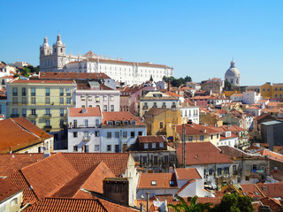 Obraz premium Panoramic view of the city, houses and pot tile roofs from Miradouro das Portas do Sol Lisbon, Portugal