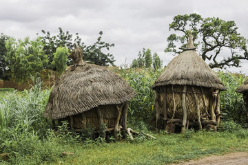 Fototapeta na wymiar Two traditional african granaries