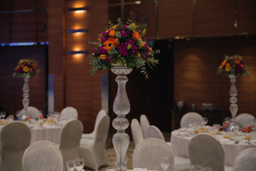 a wonderfully designed wedding room and dining tables