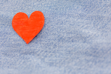Paper red heart with Denim jeans texture background. Valentine Concept
