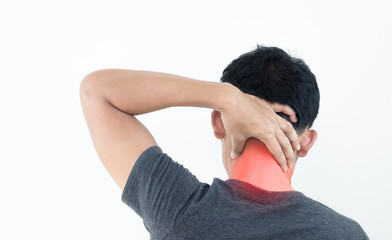 Young man feeling exhausted and suffering from neck pain, Health concept.