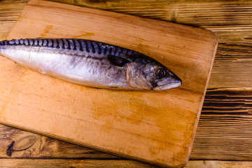 Salted scomber fish on a cutting board