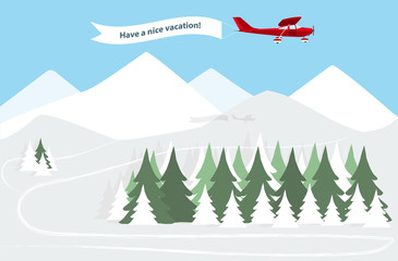Airplane with banner over winter mountains