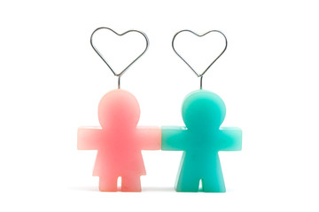 Picture stand in man and woman shape with heart symbol on top, love and romance concept