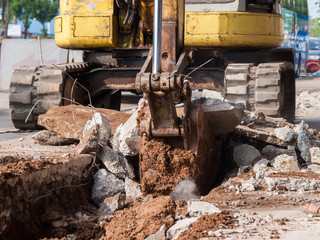 Fototapeta premium Backhoe loader in construction site