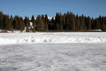 Fototapeta premium Pond ice rink in San Juan National Forest