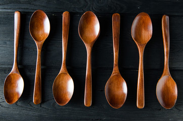 Wooden spoons arranged on table