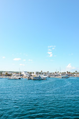 Fototapeta premium Ibiza, Spain - October 5, 2017 : Beautiful view of boat port and town in Ibiza city and Formentera islands, Spain. Sea rest and holiday concept.