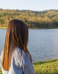 alone woman look out lake view