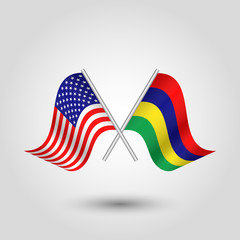 vector two crossed american and mauritian flags on silver sticks - symbol of united states of america and republic of mauritius