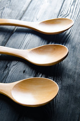 Wooden spoons arranged on table