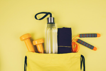 Creative flat lay of sport and fitness equipments