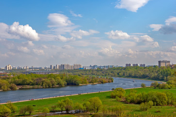 Moscow cityscape with river and park