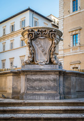 Fototapeta na wymiar Spqr emblem in Santa Maria square in Trastevere in Rome, Italy.