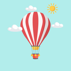Fototapeta premium Hot air balloon in the sky with clouds. Flat cartoon design. Vector illustration