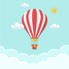 Fototapeta premium Hot air balloon in the sky with clouds. Flat cartoon design. Vector art illustration