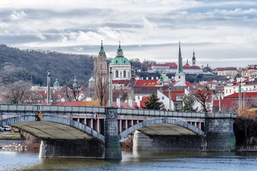 Fototapeta premium Clouds over the river Vltava