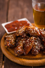 Grilled chicken wings with hot sauce