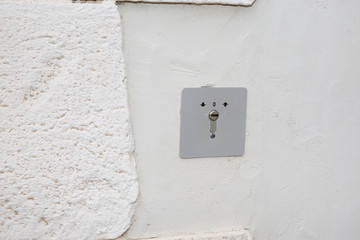 alarm lock on the wall of the house