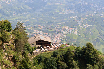 Mountain Inn Hochmuth and village Tirol panorama in South Tyrol